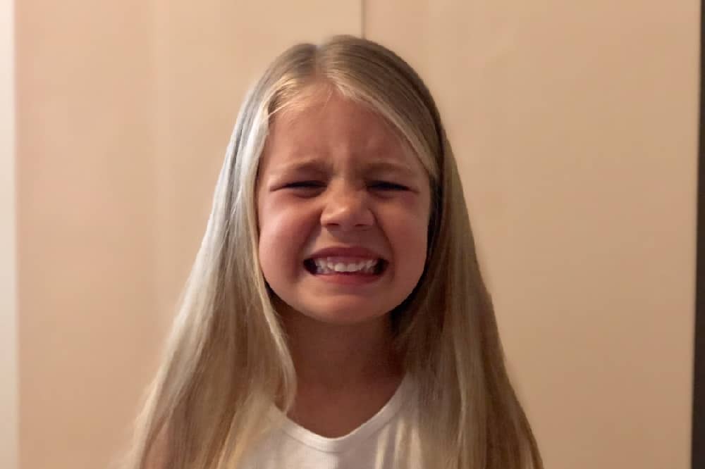 Child Grinding Their Teeth Featured