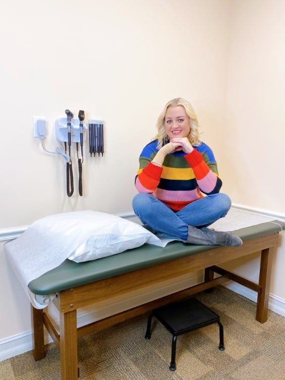 MD Now in East Boca featuring mom sitting on exam table
